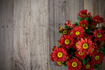 Red bouquet and wooden.