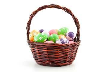 colored Easter eggs in a basket