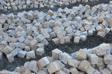 Heaps of cobblestones, pavement construction