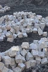 Heaps of cobblestones, pavement construction