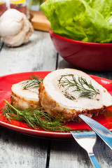 Sliced pork lion roll stuffed with mushrooms