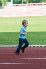 boy exercising on a treadmill