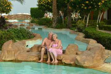 Senior couple at pool