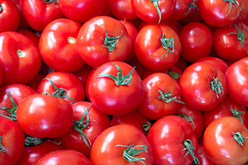 Fresh tomatoes as background