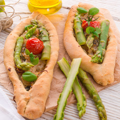 home-baked pide with green asparagi