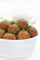 Fried pork meatballs in bowl