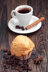 Muffin with nuts and coffee