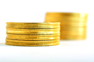 Golden coins stacks