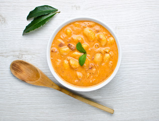 Traditional Polish cuisine:butter beans with tomatoes, bacon