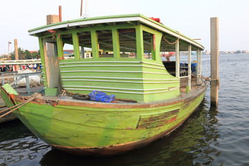 Old wooden green boat
