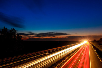 Cars speeding on a highway