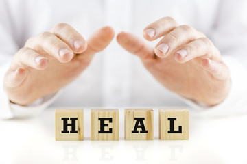 Conceptual image with the word Heal
