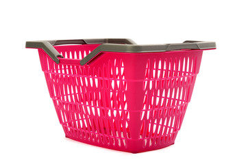 Pink plastic shopping basket.Closeup on empty market basket.