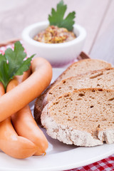 tasty sausages frankfurter with grain bread