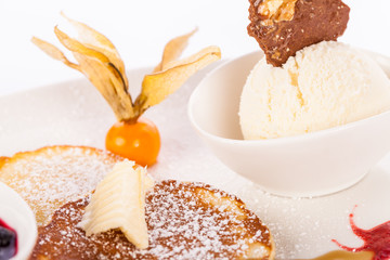 tasty sweet pancakes with vanilla icecream and topping