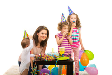 Mother and children at birthday party