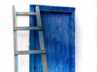 Blue Ladder and Blue Wooden Door in Mykonos