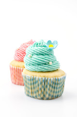 Vanilla cupcakes isolated white background