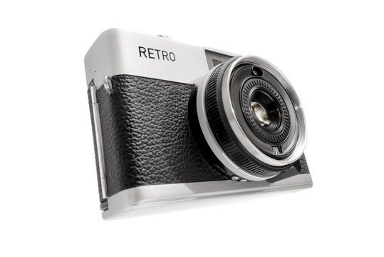 Vintage compact camera isolated on white