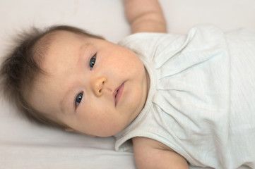 Newborn baby in white