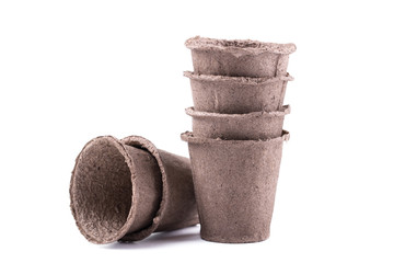 Peat pots isolated on white background