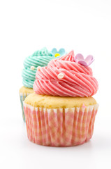 Vanilla cupcakes isolated white background