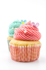 Vanilla cupcakes isolated white background