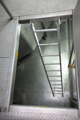 metal ladder in high tech stainless steel space
