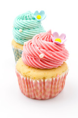 Vanilla cupcakes isolated white background