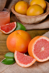 Ripe grapefruit on table close-up