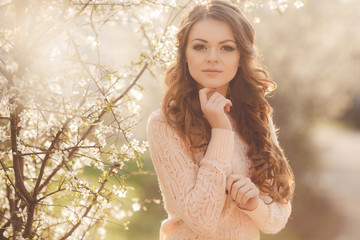 Beautiful woman enjoying the outdoors in the garden