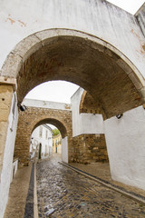 Fototapeta premium View of the well known arch entrance of Faro city, Portugal.