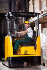 Smiling forklift driver