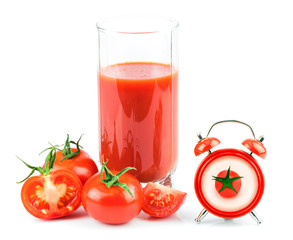 Concept with tomato juice, clock and tomato