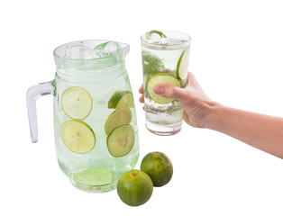 Female hand holding lime juice