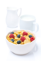 cornflakes with berries and fresh milk, isolated