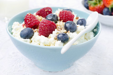 cottage cheese with berries, honey and nuts, fresh berries