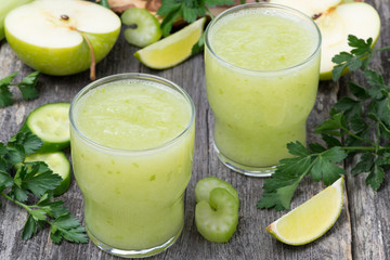 detox cocktail of green apple, celery and lime, top view