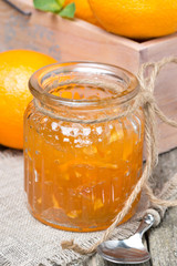 orange marmalade in a glass jar