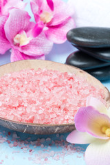 pink sea salt, stones for spa and flowers