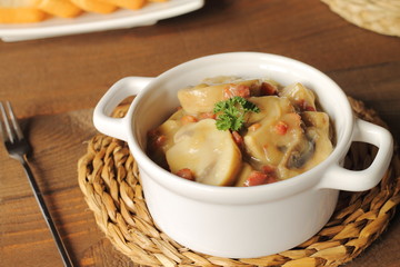 Mushrooms and prosciutto casserole