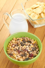 Delicious and healthy cereal in bowl with milk