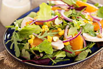 Salad with chicken, oranges and greens