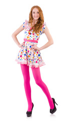 Young model with pink stockings on white
