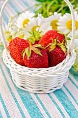 Strawberries in a basket on napkin