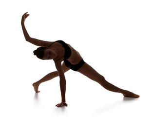 modern style dancer posing on studio background