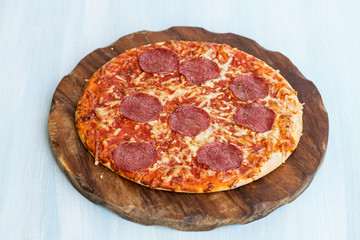 Traditional Italian pizza with salami.