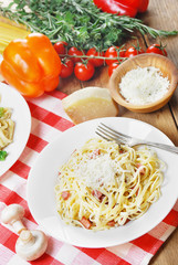 Pasta carbonara on the wooden table