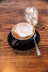 Coffee cup on a wooden table