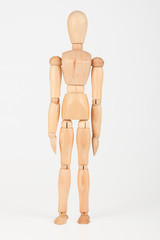 Plain wood mannequin stand upright isolated on white
